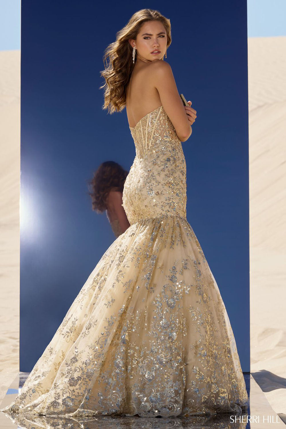 Sherri Hill 56775 prom dress images. Sherri Hill 56775 is available in these colors: Royal, Fuchsia, Peacock, Ivory, Blush, Light Blue, Navy, Red, Silver, Gold, Black.