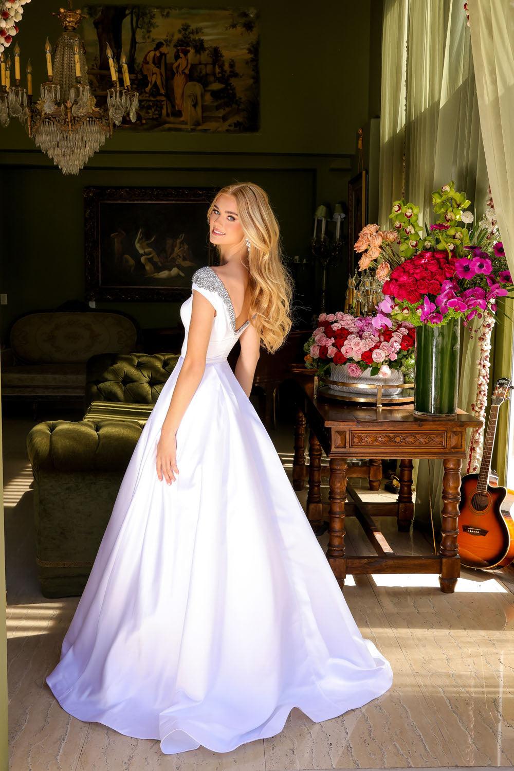 Ava Presley 39322 prom dress images.  Ava Presley 39322 is available in these colors: White, Sky Blue, Orchid, Red.