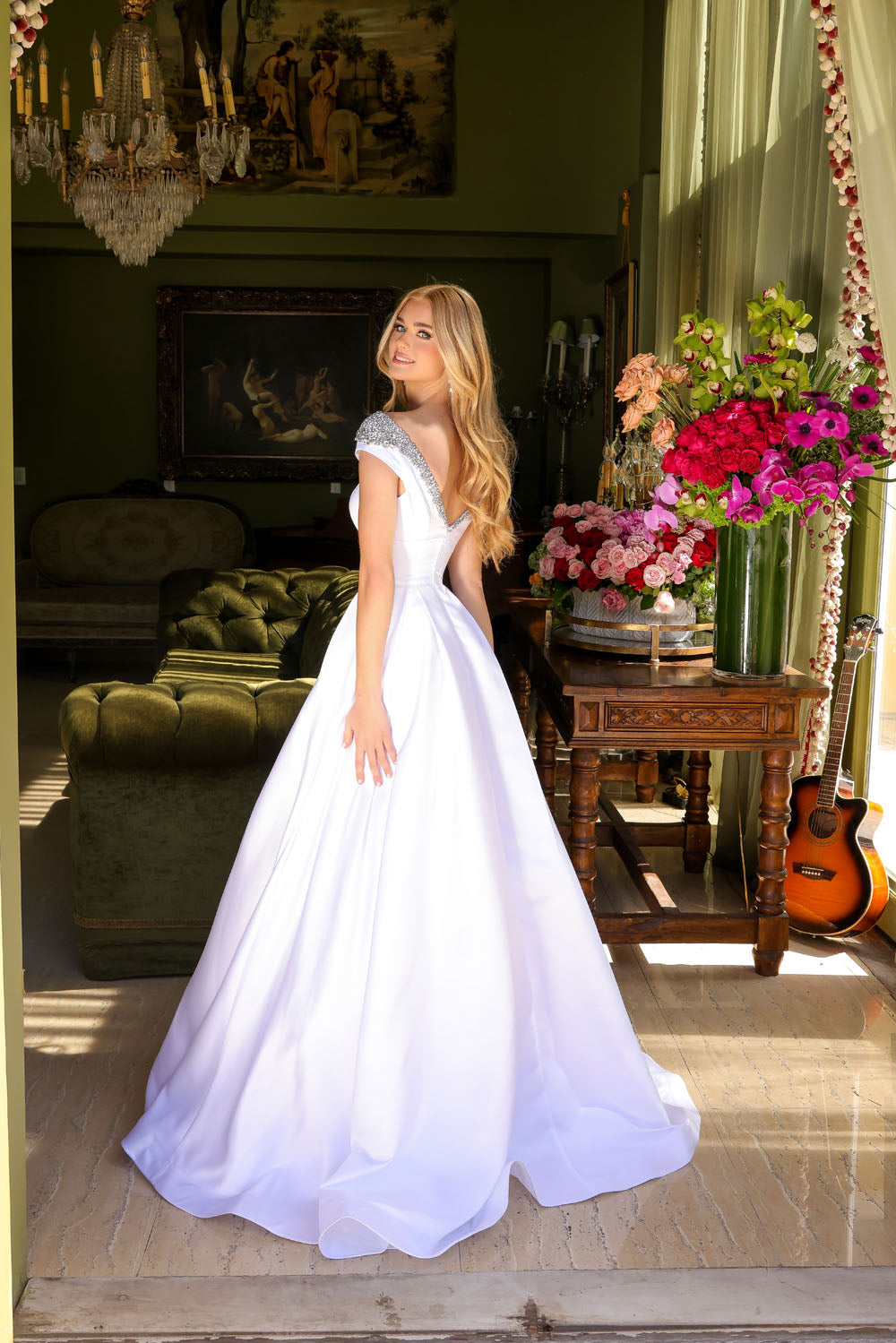 Ava Presley 39322 prom dress images.  Ava Presley 39322 is available in these colors: White, Sky Blue, Orchid, Red.