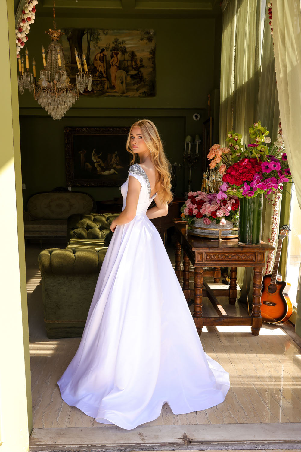 Ava Presley 39322 prom dress images.  Ava Presley 39322 is available in these colors: White, Sky Blue, Orchid, Red.