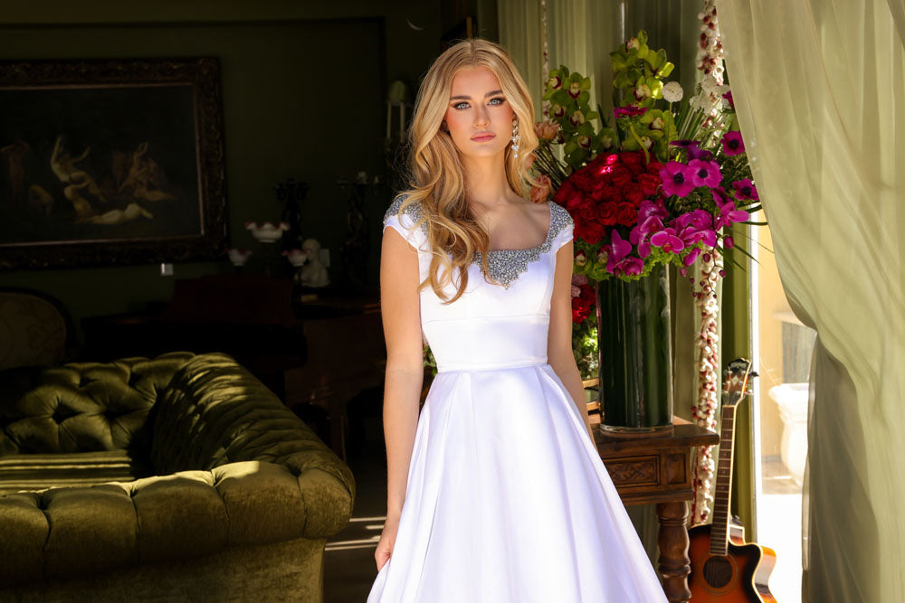 Ava Presley 39322 prom dress images.  Ava Presley 39322 is available in these colors: White, Sky Blue, Orchid, Red.