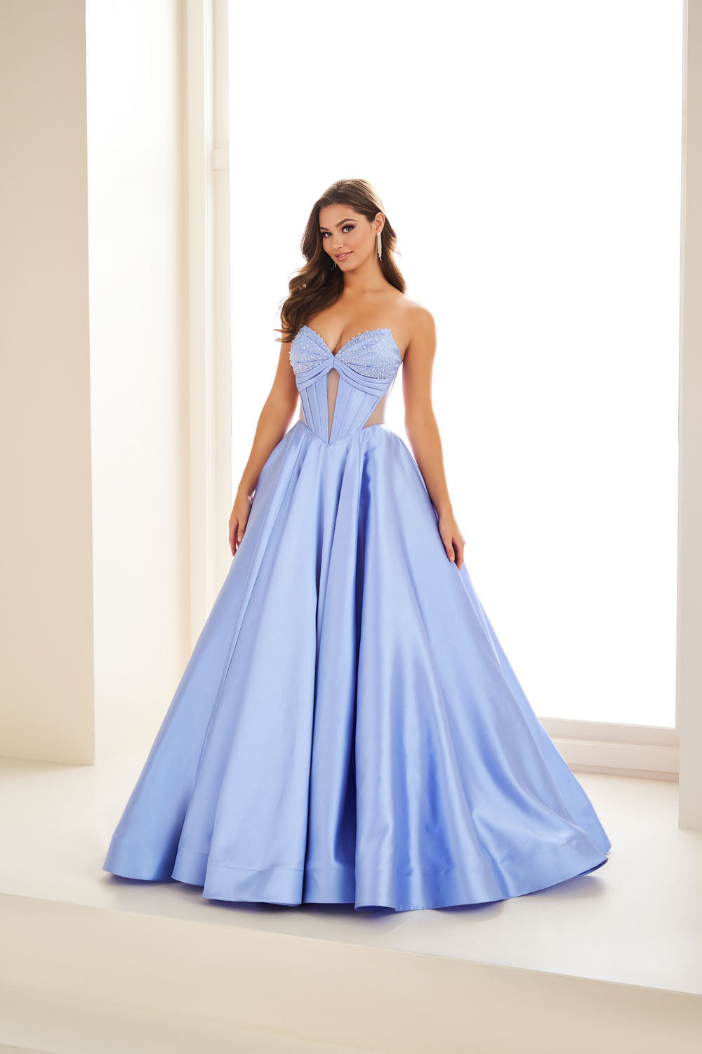 Ellie Wilde EW36025 ball gown prom dress images.  Ellie Wilde EW36025 is available in these colors: Ice Blue, Blue Hydrangea, Red, Emerald, Black, Diamond White.