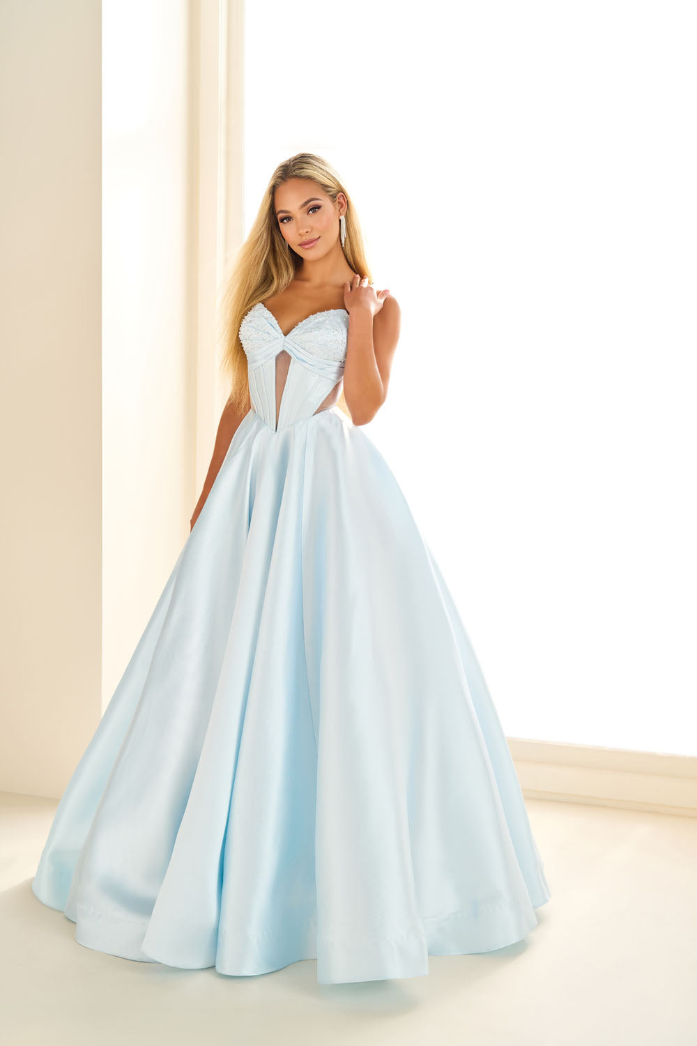 Ellie Wilde EW36025 ball gown prom dress images.  Ellie Wilde EW36025 is available in these colors: Ice Blue, Blue Hydrangea, Red, Emerald, Black, Diamond White.