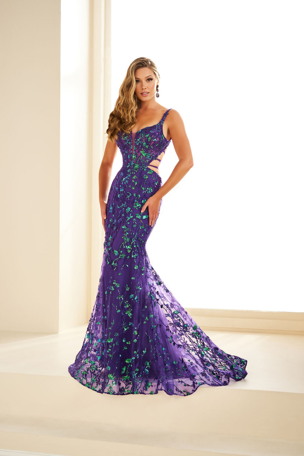 Ellie Wilde EW36043 mermaid prom dress images.  Ellie Wilde EW36043 is available in these colors: Orange, Emerald, Purple Magic.