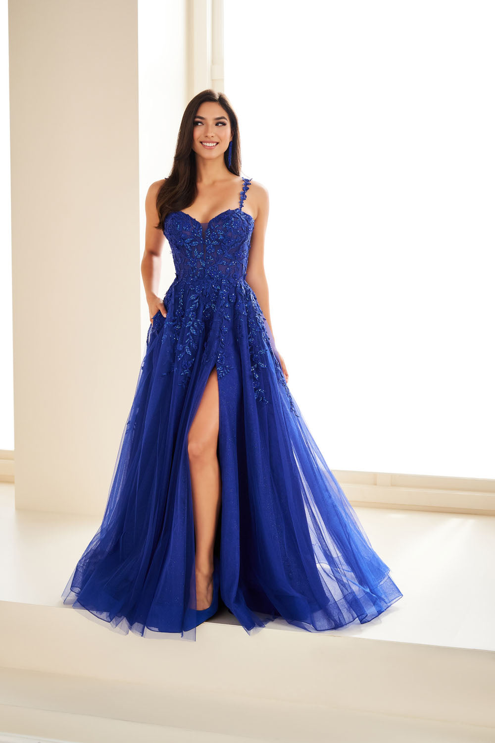 Ellie Wilde EW36046 a-line prom dress images.  Ellie Wilde EW36046 is available in these colors: Papaya, Royal Blue, Blue Hydrangea, Dark Teal, Wine, Plum.