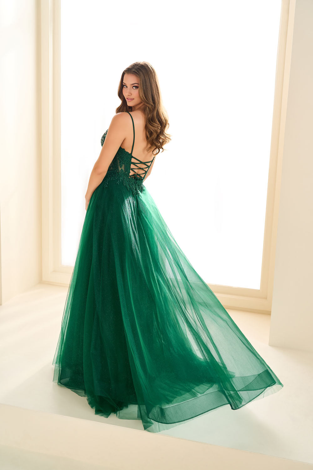 Ellie Wilde EW36066 a-line prom dress images.  Ellie Wilde EW36066 is available in these colors: Emerald, Blue Moon.