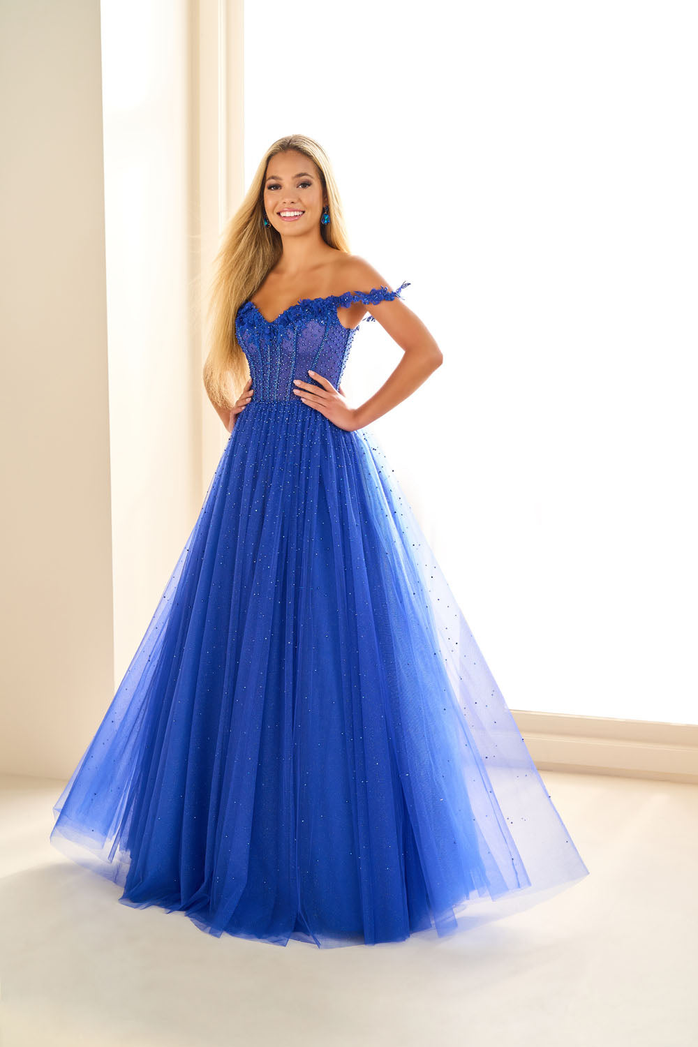 Ellie Wilde EW36071 ball gown prom dress images.  Ellie Wilde EW36071 is available in these colors: Royal Blue, Emerald, Dusty Rose Gold.