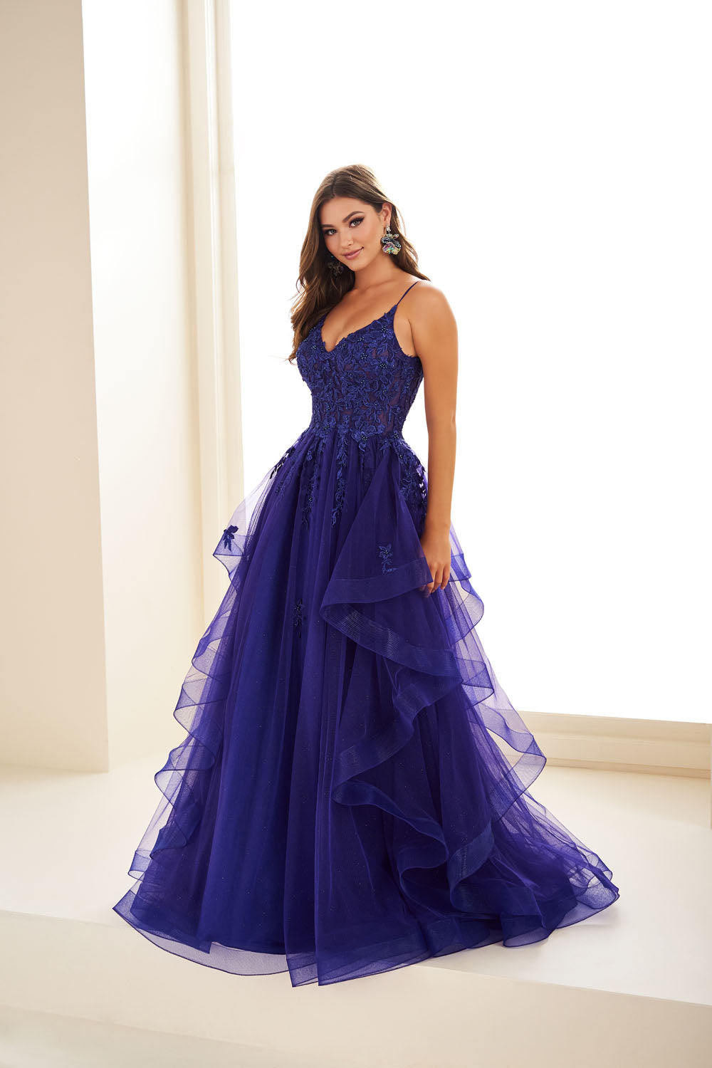 Ellie Wilde EW36085 a-line prom dress images.  Ellie Wilde EW36085 is available in these colors: Bluebell, Ice Blue, Wine, Indigo, Emerald.