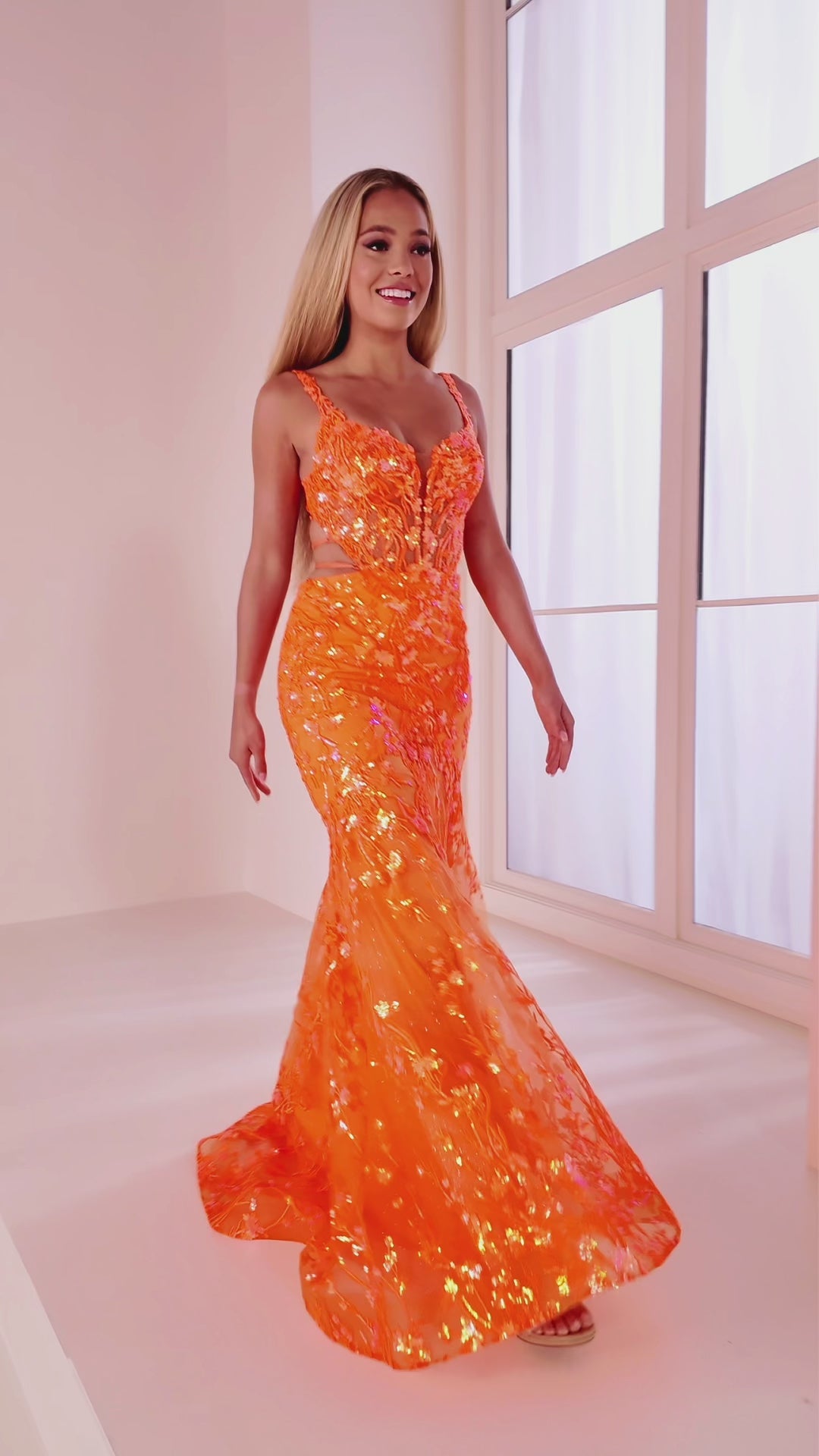 Ellie Wilde EW36043 mermaid prom dress video.  Ellie Wilde EW36043 is available in these colors: Orange, Emerald, Purple Magic.