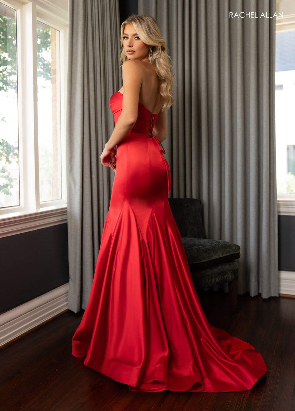 Rachel Allan 70869 prom dress images.  Rachel Allan 70869 is available in these colors: Black, Emerald, Red, Royal.