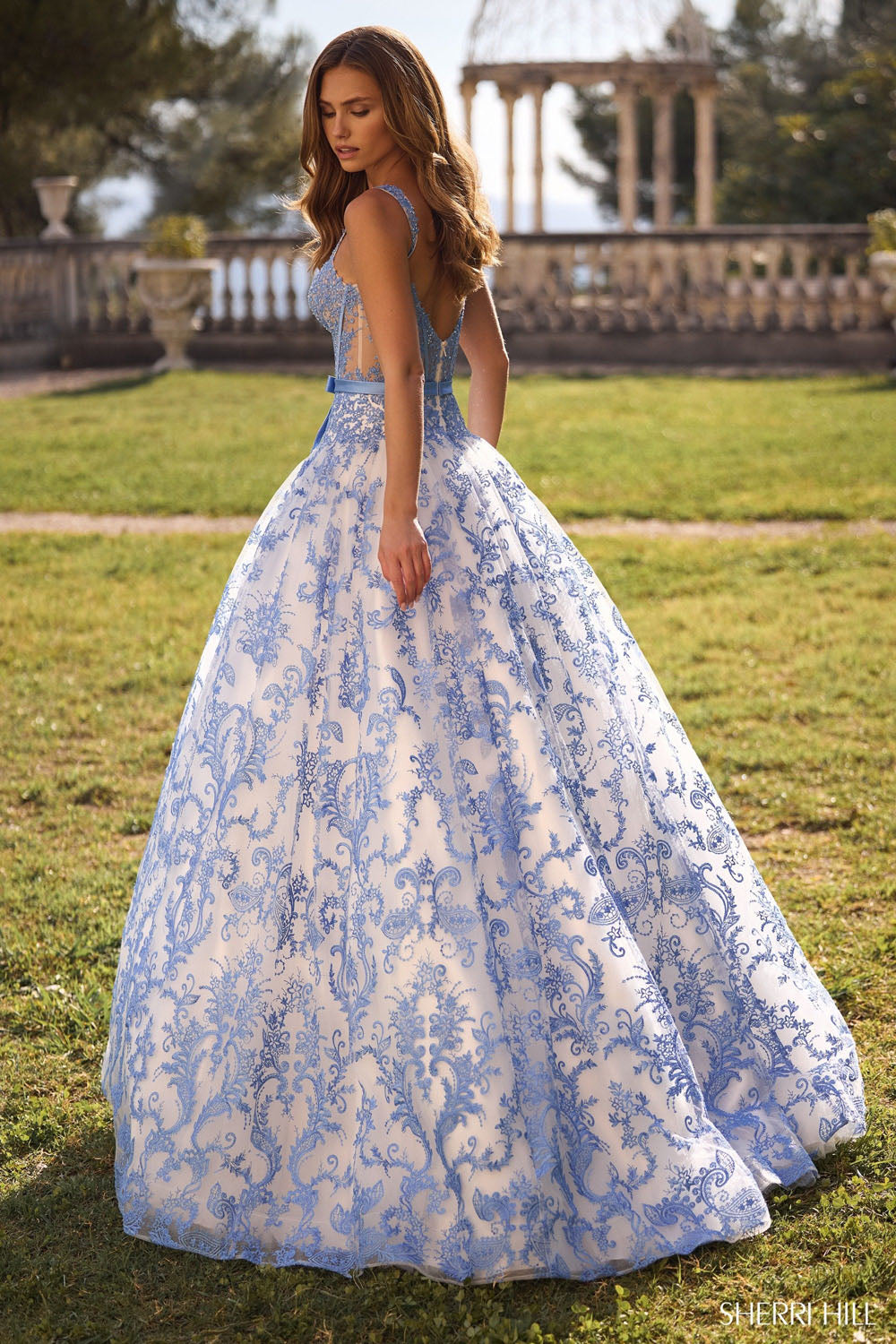 Sherri Hill 57058 prom dress images.  Sherri Hill 57058 is available in these colors: Ivory Blue.