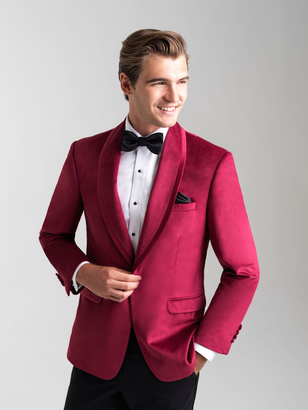 Ruby Red Venice Velvet Tuxedo is a single button shawl lapel jacket with double vents and a Ultra Slim tailored fit