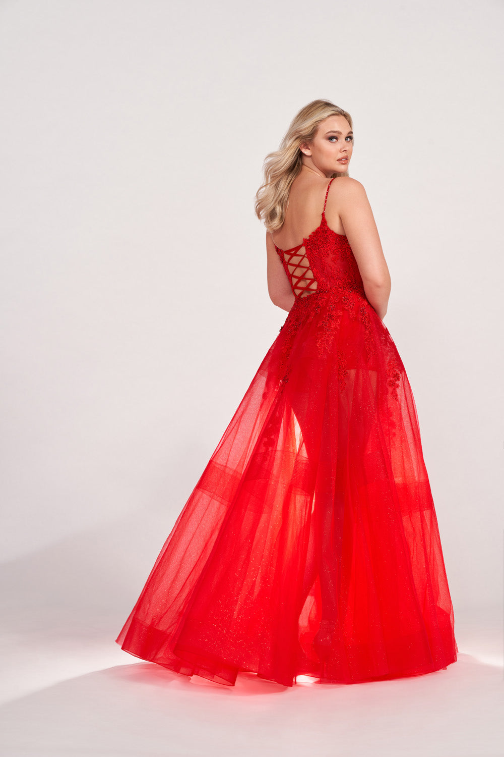 Ellie Wilde EW34032 prom dress images.  Ellie Wilde EW34032 is available in these colors: Red, Hot Pink, Royal Blue, Black.