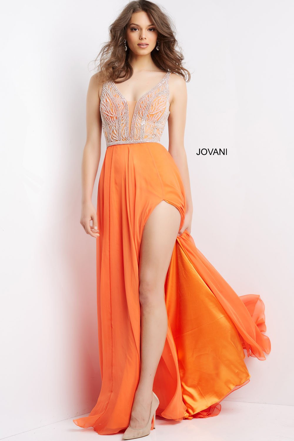 Jovani 07136 prom dress images.  Jovani style 07136 is available in these colors: Orange, Hot Pink, Light Blue, Off White, Royal.