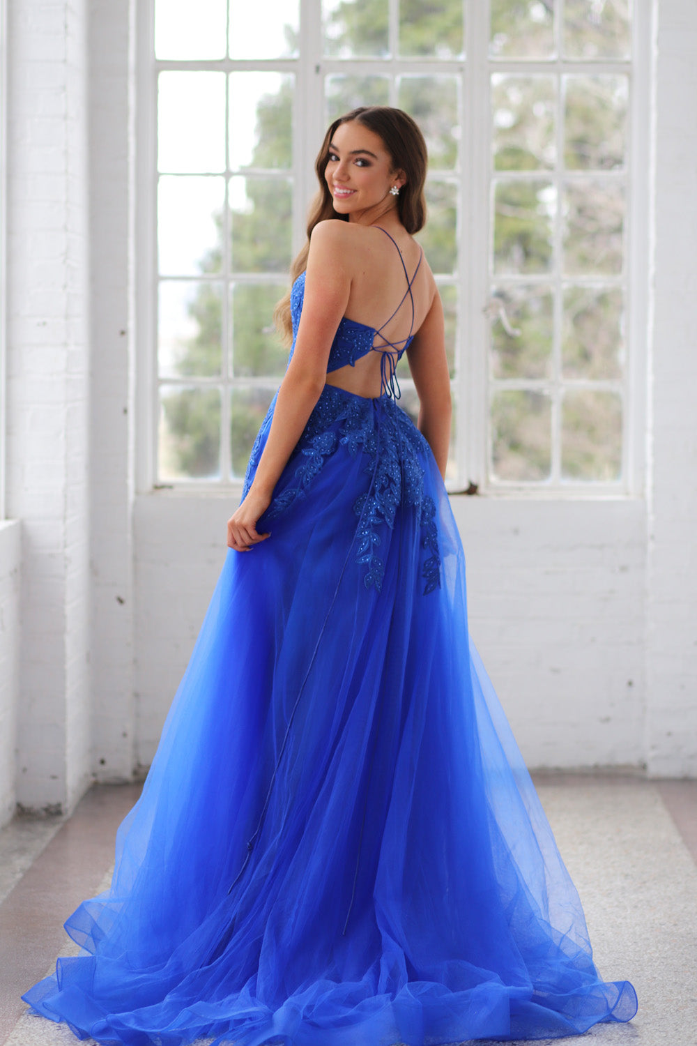 Miah Vega 22410 is a $498 aline ball gown and comes in the following colors: Emerald, Rose, Royal and White.