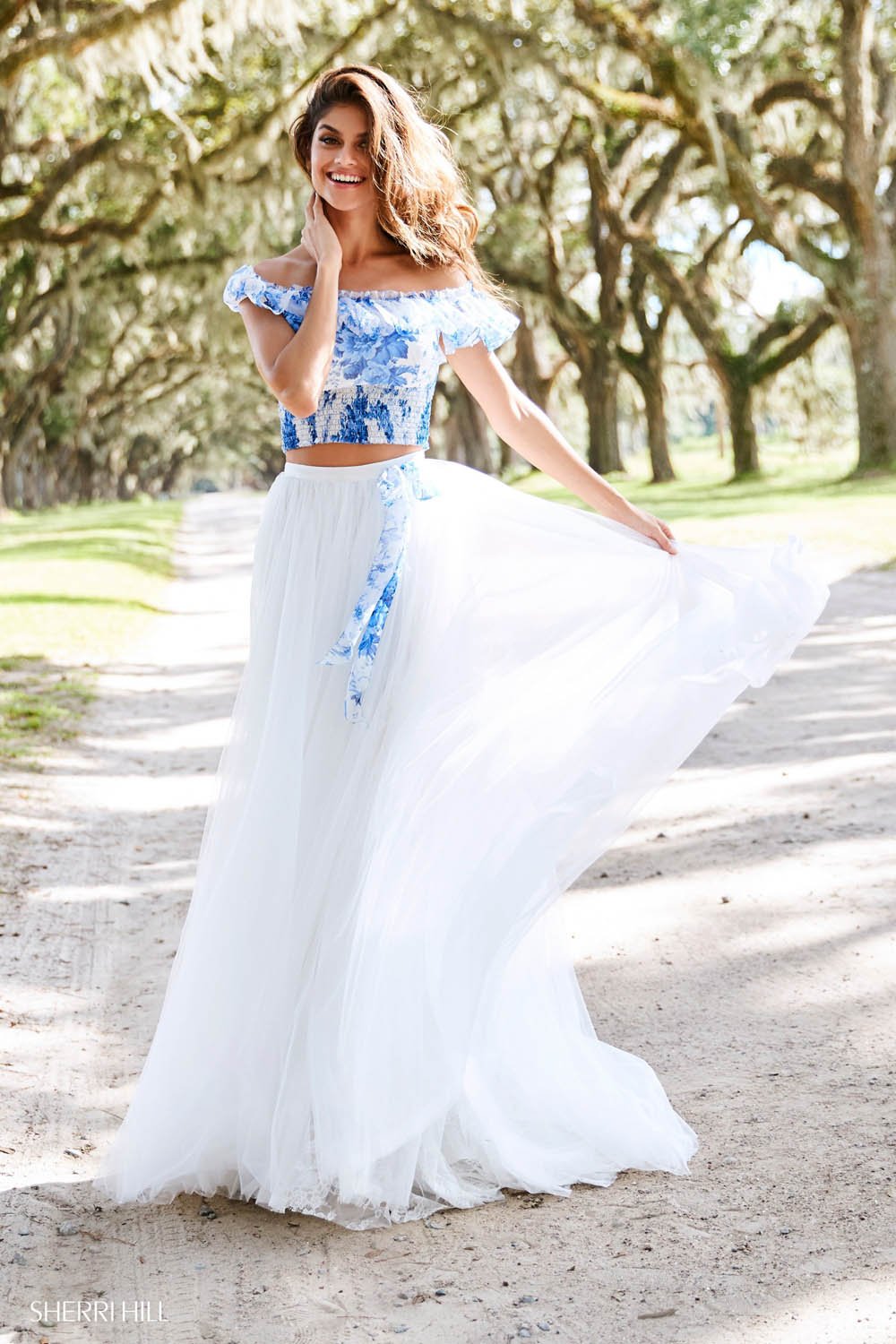 Sherri Hill 52910 prom dress images.  Sherri Hill 52910 is available in these colors: Blue Ivory Print.