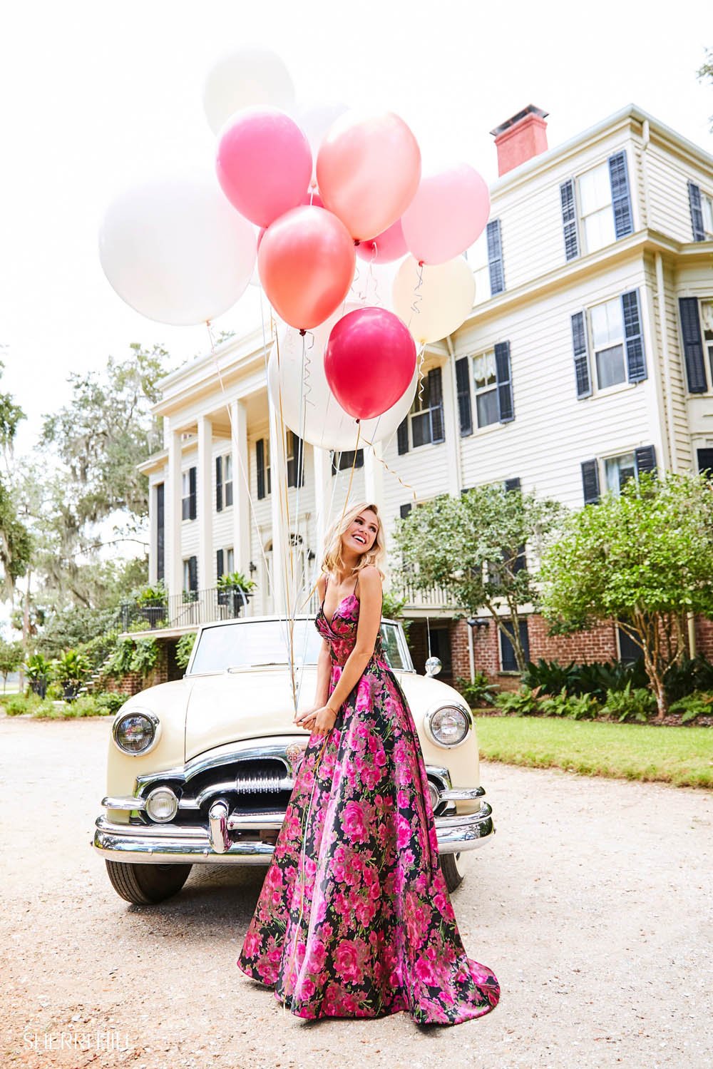 Sherri Hill 52932 prom dress images.  Sherri Hill 52932 is available in these colors: Black Fuchsia Print.