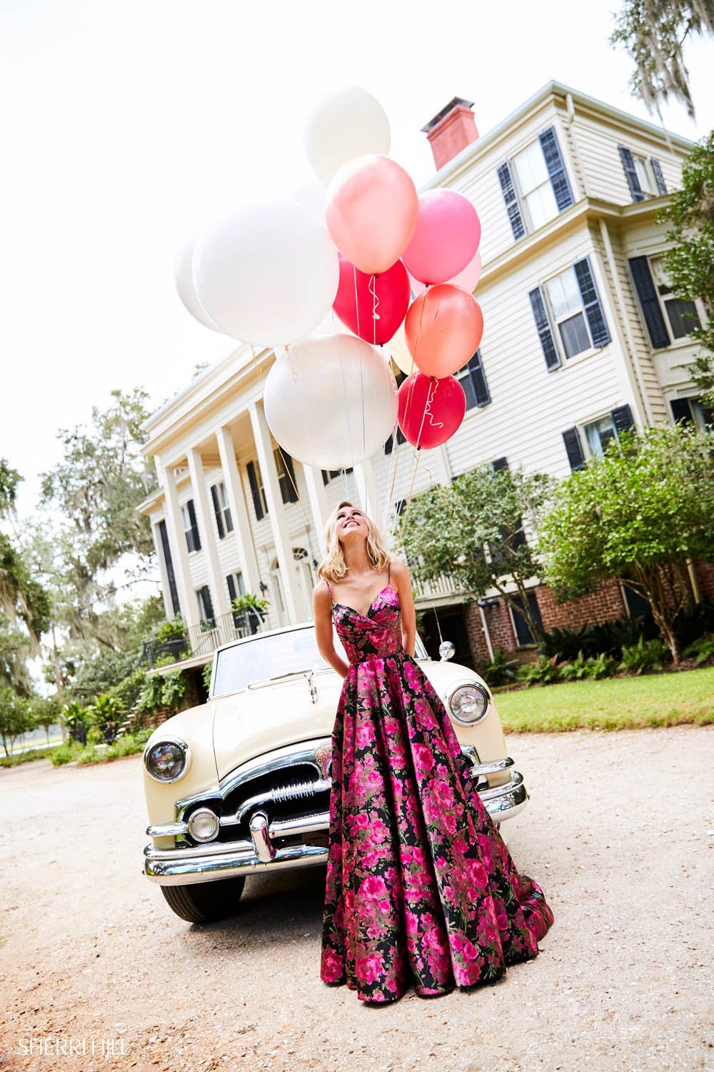 Sherri Hill 52932 prom dress images.  Sherri Hill 52932 is available in these colors: Black Fuchsia Print.