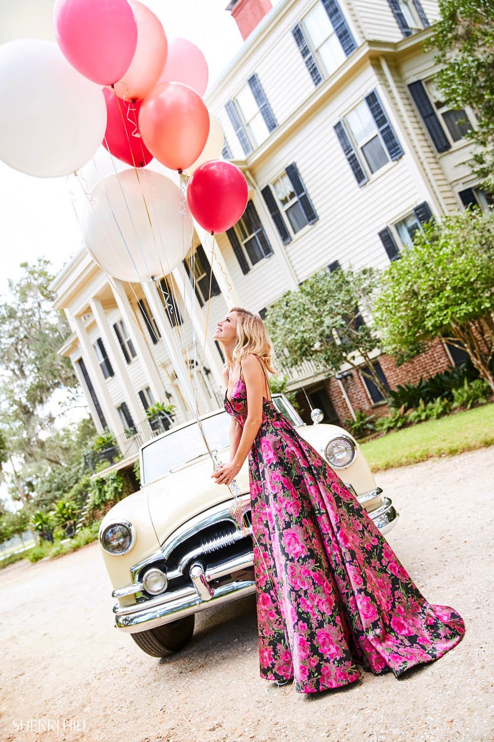 Sherri Hill 52932 prom dress images.  Sherri Hill 52932 is available in these colors: Black Fuchsia Print.